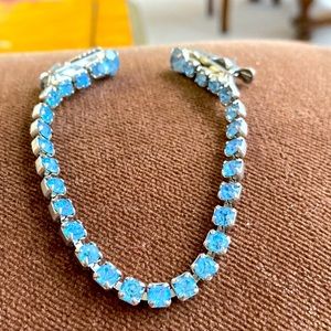 MCM 1950s sky blue glass rhinestone sweater clips.